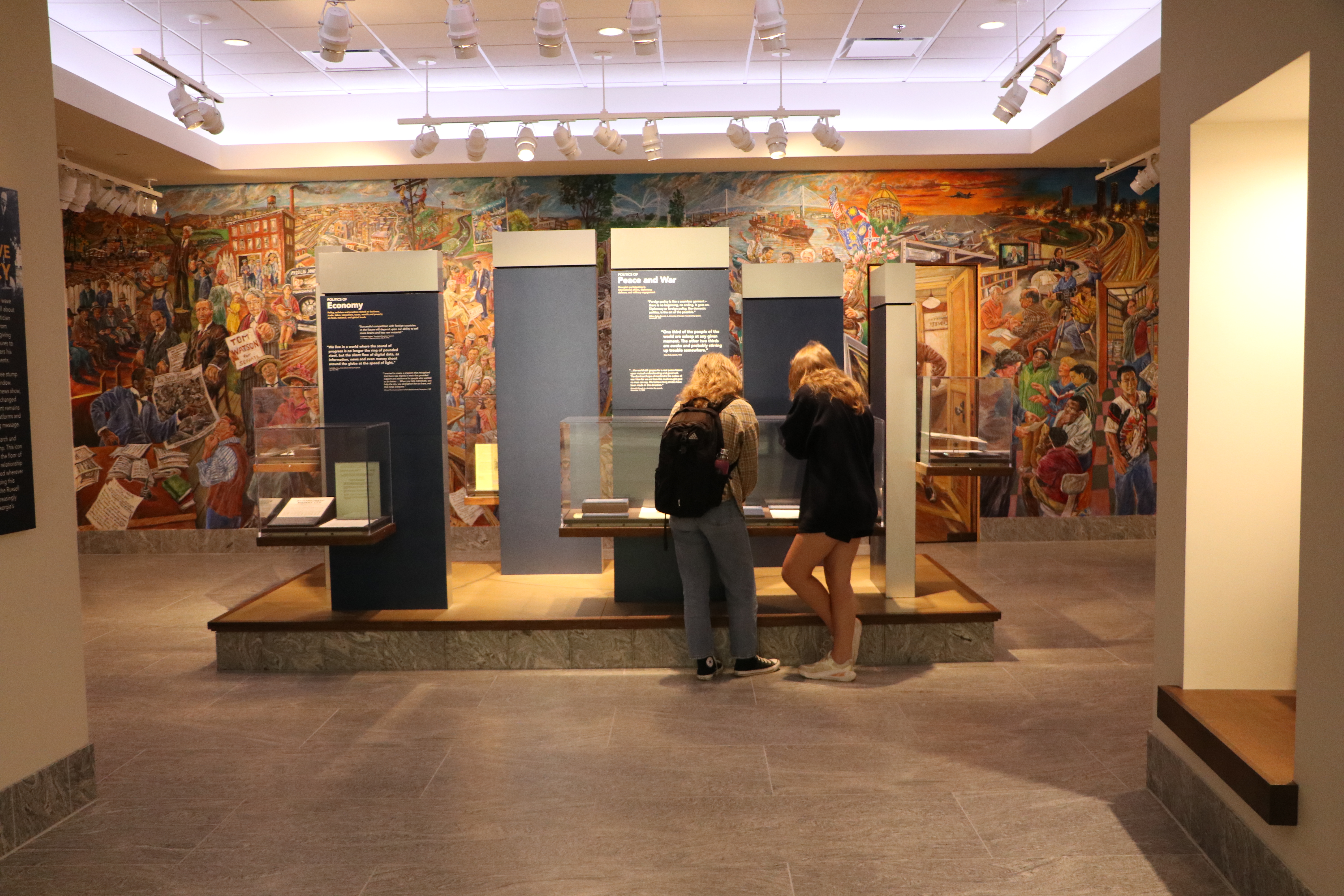 Students looking at a museum exhibit