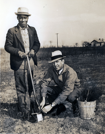 Russell with a Georgia farmer in the 1930s.