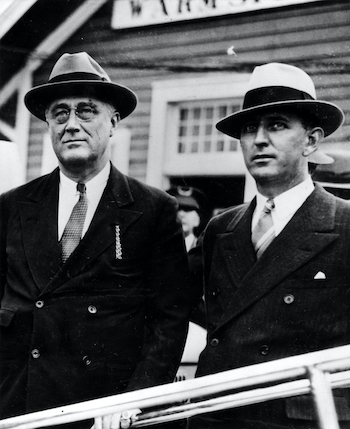 Russell campaigning in Warm Springs, Georgia, with Franklin Delano Roosevelt in 1932. 